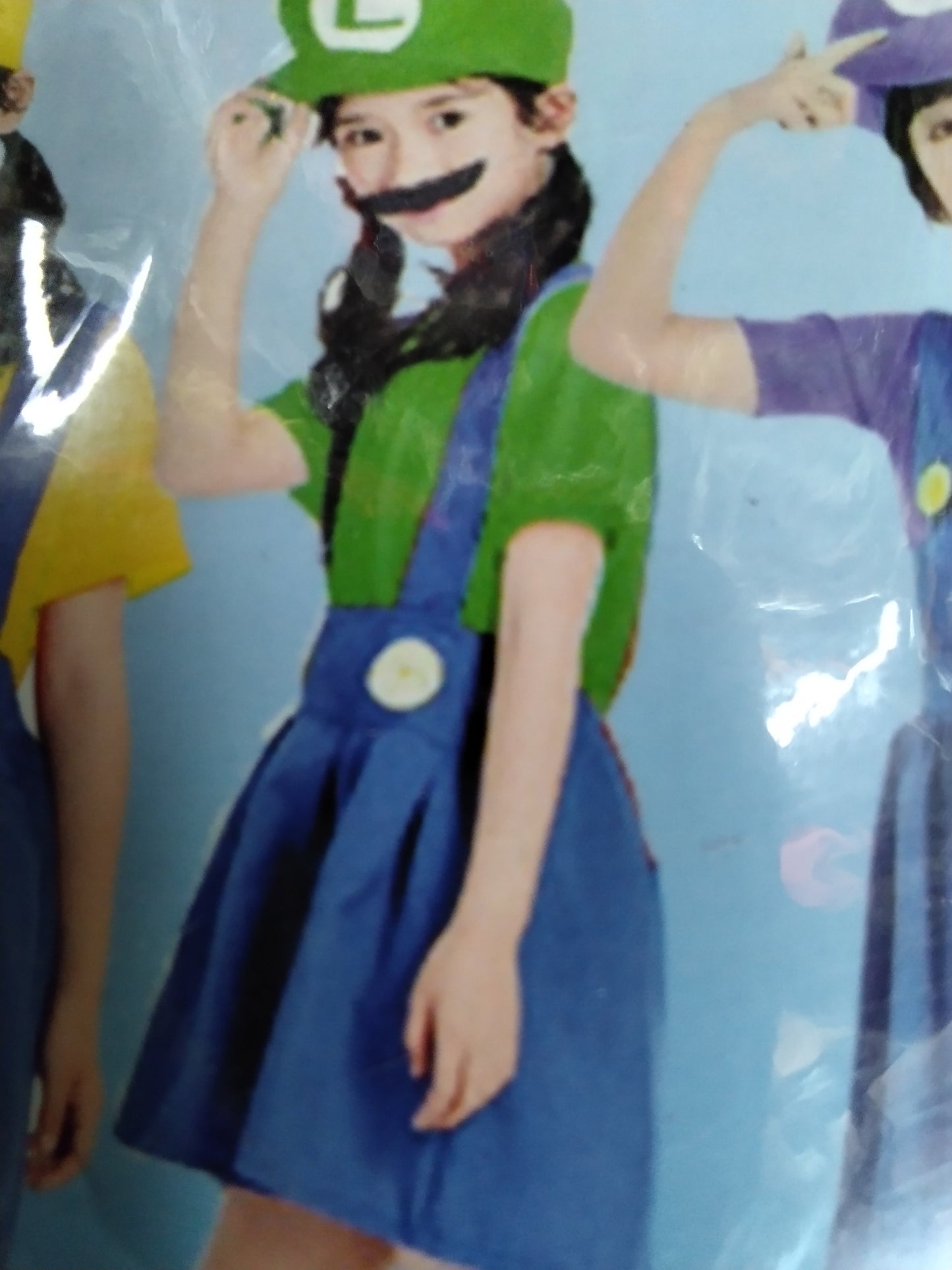 Niña plomera verde